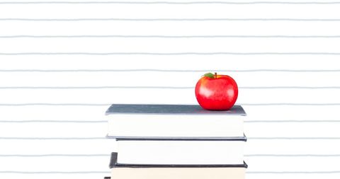Apple on Books with Education Symbols Against Lined Background - Download Free Stock Images Pikwizard.com