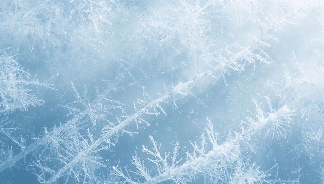 Macro frost crystals forming on glass with dendritic hoarfrost patterns