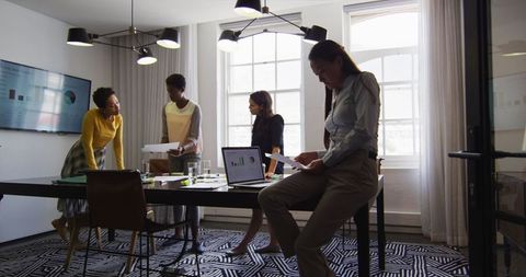 Collaborative Meeting of Businesswomen in Modern Office Setting - Download Free Stock Images Pikwizard.com