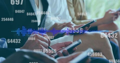 Businesspeople using devices with overlay of data and analytics