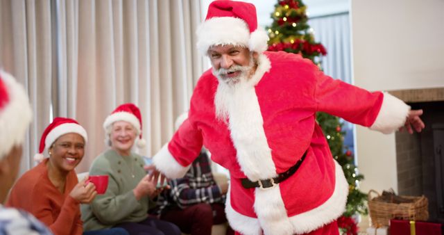 Diverse Group Celebrating Christmas with Santa Claus Leaning Forward - Download Free Stock Images Pikwizard.com