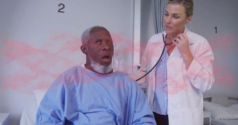 Doctor Conducting Checkup on Patient with Stethoscope in Hospital Room