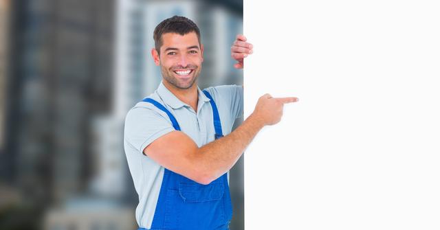 Digital composite of Worker pointing at blank bill board