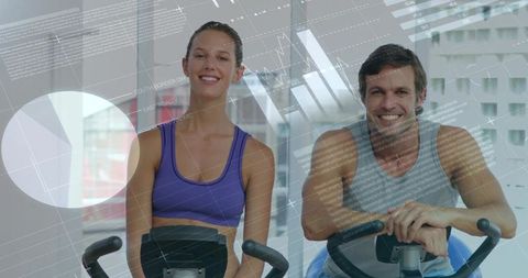 Smiling duo pedaling in gym with dynamic graphs and data influence