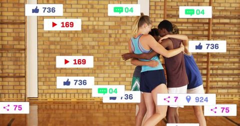 Diverse team huddle with social media engagement in gym