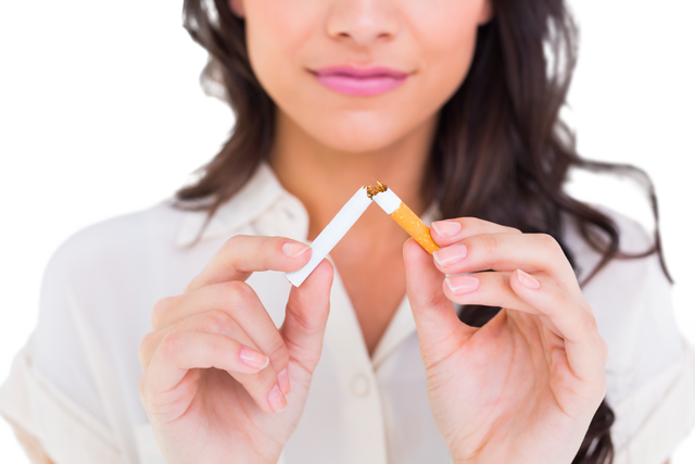 Determined Woman Breaking Cigarette Emphasizing Anti-Smoking Transparent Background - Download Free Stock Videos Pikwizard.com