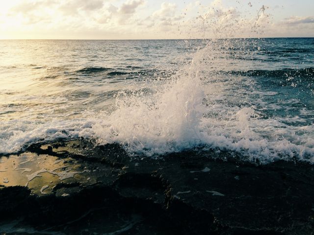 Ocean Waves Crashing on Rocky Shore at Sunset - Download Free Stock Photos Pikwizard.com