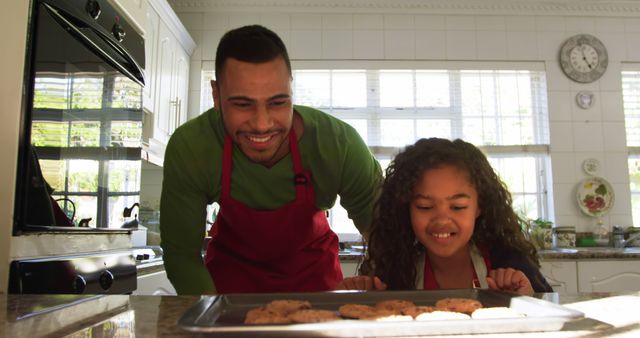 Father and Daughter Baking Cookies Together in Kitchen - Download Free Stock Images Pikwizard.com