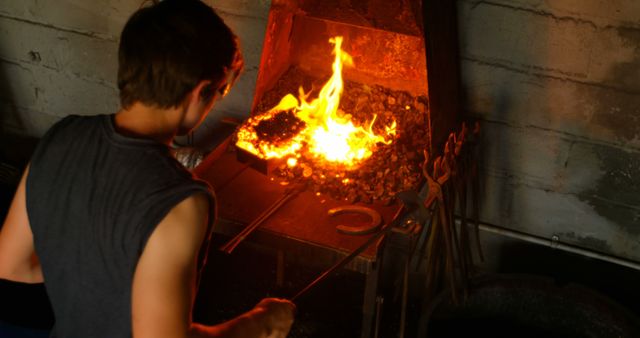 Blacksmith Shaping Metal in Forging Workshop - Download Free Stock Images Pikwizard.com