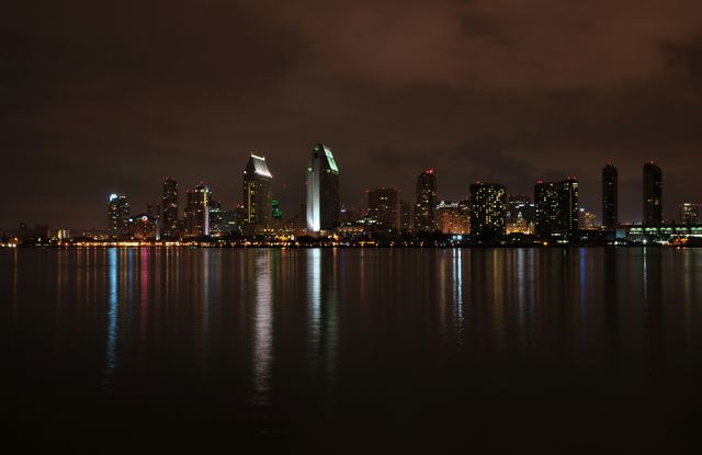 Night Cityscape of San Diego Harbor with Reflections on Water - Download Free Stock Photos Pikwizard.com