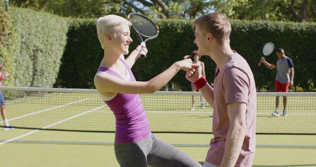 Happy Tennis Players Celebrating on Court - Download Free Stock Images Pikwizard.com