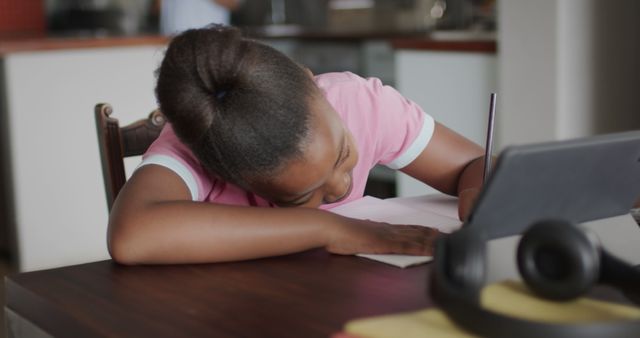 Focused African American Girl Studying with Digital Tablet at Home - Download Free Stock Images Pikwizard.com