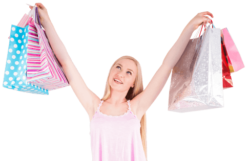 Smiling blonde young woman holding colorful gift shopping bags transparent background
