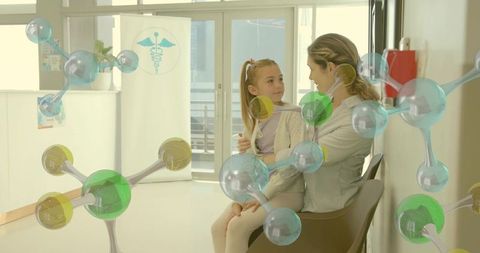 Mother and daughter embracing in modern medical clinic with molecular overlay