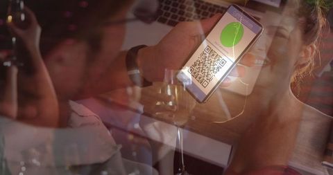 Digital Vaccination Passport in Use at Social Gathering