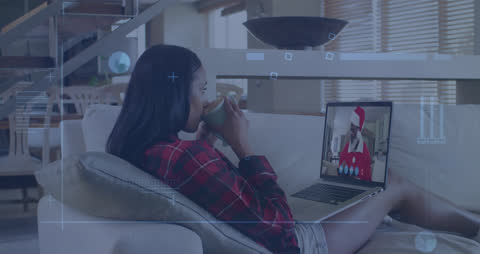 Woman Hosting Virtual Holiday Video Call with Festive Flair
