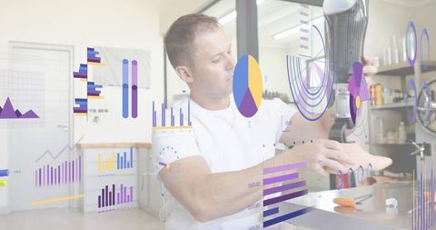 Prosthetist examining prosthetic leg with augmented reality data overlays in lab