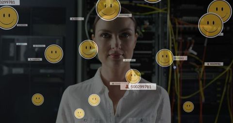 Female it specialist in server room with digital cloud interface