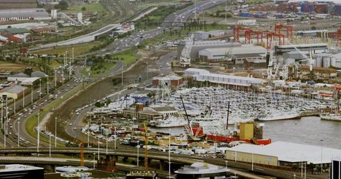 Industrial harbor with busy marina and shipping operations