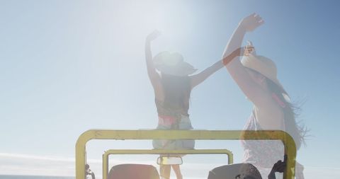 Joyful Woman in Convertible Embracing Beach Holiday
