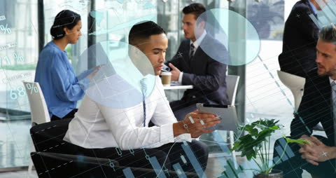 Business Team Integrating Data Analytics in Modern Office Space