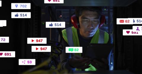 It technician analyzing data amongst social media icons