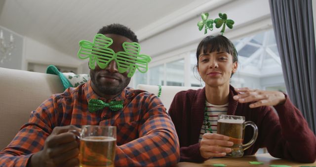 Festive Diverse Couple Celebrating St. Patrick's Day with Beer - Download Free Stock Images Pikwizard.com