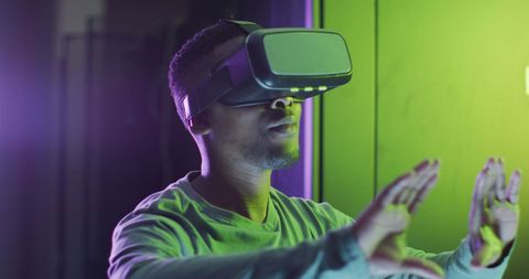 African American Man Using VR Headset for Advanced Technology Experience - Download Free Stock Images Pikwizard.com