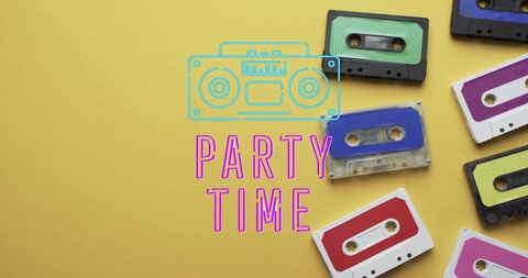 Party time retro cassette tapes on yellow background