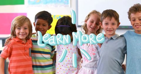 Elementary students linking arms in colorful classroom promoting teamwork and learning