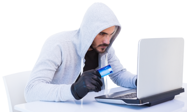 Hacker Wearing Hoodie Using Credit Card on Laptop Transparent - Download Free Stock Videos Pikwizard.com