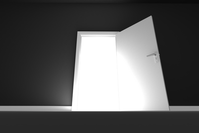 Low angle view of sunlight coming through open door in dark room with black background - Download Free Stock Videos Pikwizard.com