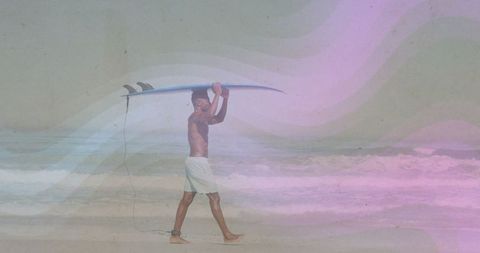Surfer walking on beach with surfboard in a serene scene