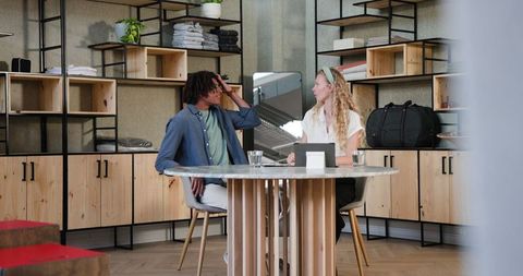 Diverse Colleagues Discussing Ideas at Modern Office Table
