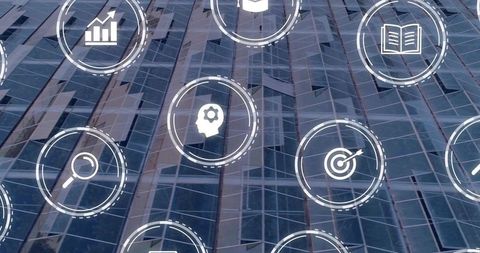 Projecting digital business icons over glass office facade, futuristic interface overlay
