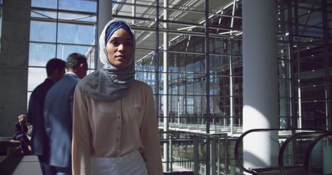 Confident Businesswoman in Modern Corporate Environment