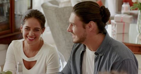 Joyful Couple Embracing at Home in Warm Atmosphere