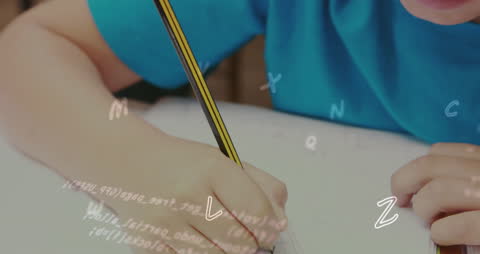 Child Learning with Letters and Pencil in Hand