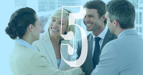 Business Professionals Shaking Hands with Number Five Overlay