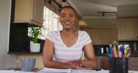 African American Woman Engaging in Virtual Call at Home