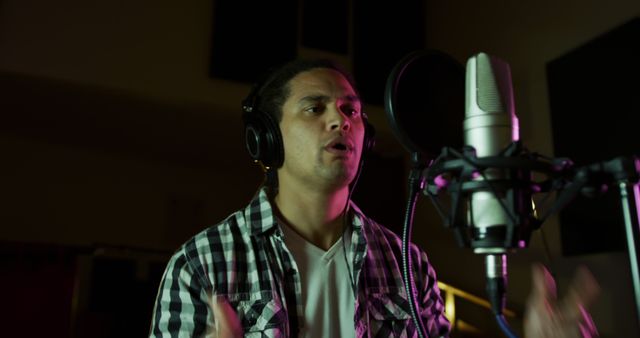 Male Vocalist Recording Song in Professional Music Studio - Download Free Stock Images Pikwizard.com
