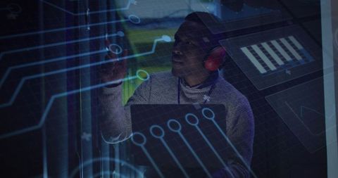 Adjusting server rack with holographic interface and tablet in futuristic data center