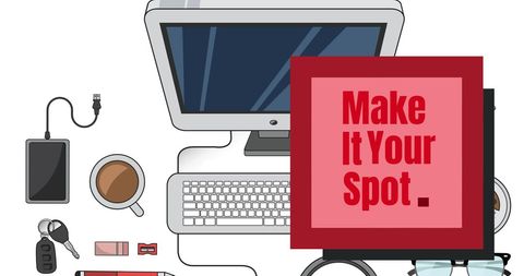 Organized desk with inspirational note and office supplies