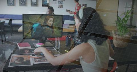 Creative professional organizing photo project in modern studio environment