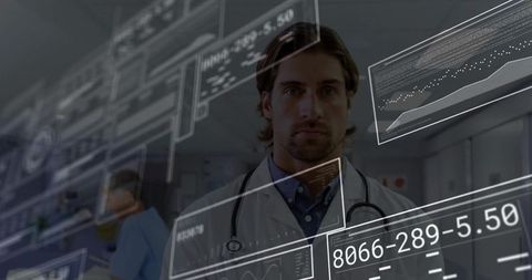 Doctor Analyzing Digital Medical Data in Hospital Corridor
