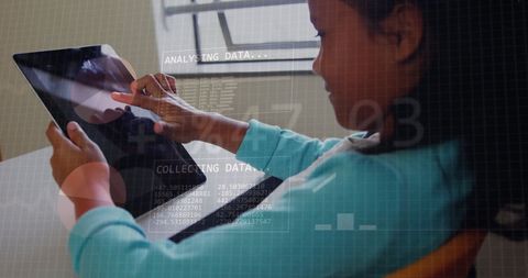 Child exploring technology with augmented data interface