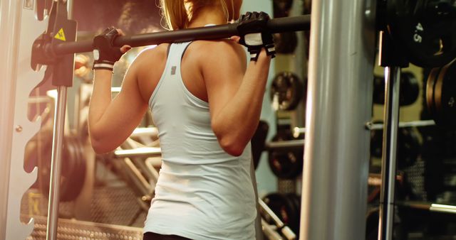 Woman Weightlifting in Gym with Sunlight - Download Free Stock Images Pikwizard.com