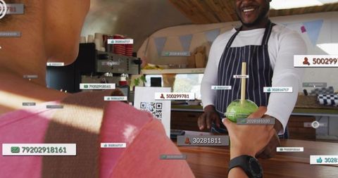 Serving contactless green smoothie at pop-up coffee bar with qr code payment