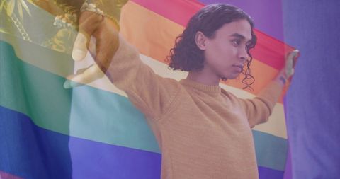 Pride Celebration with Interracial LGBTQ+ Couple and Rainbow Flag - Download Free Stock Images Pikwizard.com