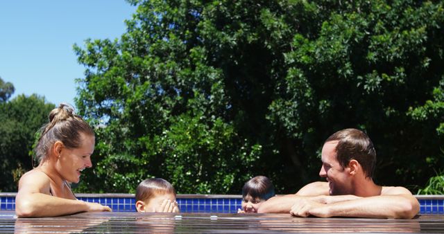 Family Enjoying Refreshing Pool Time Outdoors - Download Free Stock Images Pikwizard.com